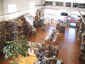 Interior view of Winston Smith Books store from upstairs looking down