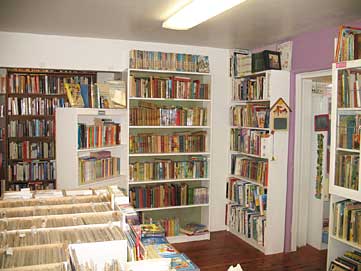 View of books filling shelves at Winston Smith Books